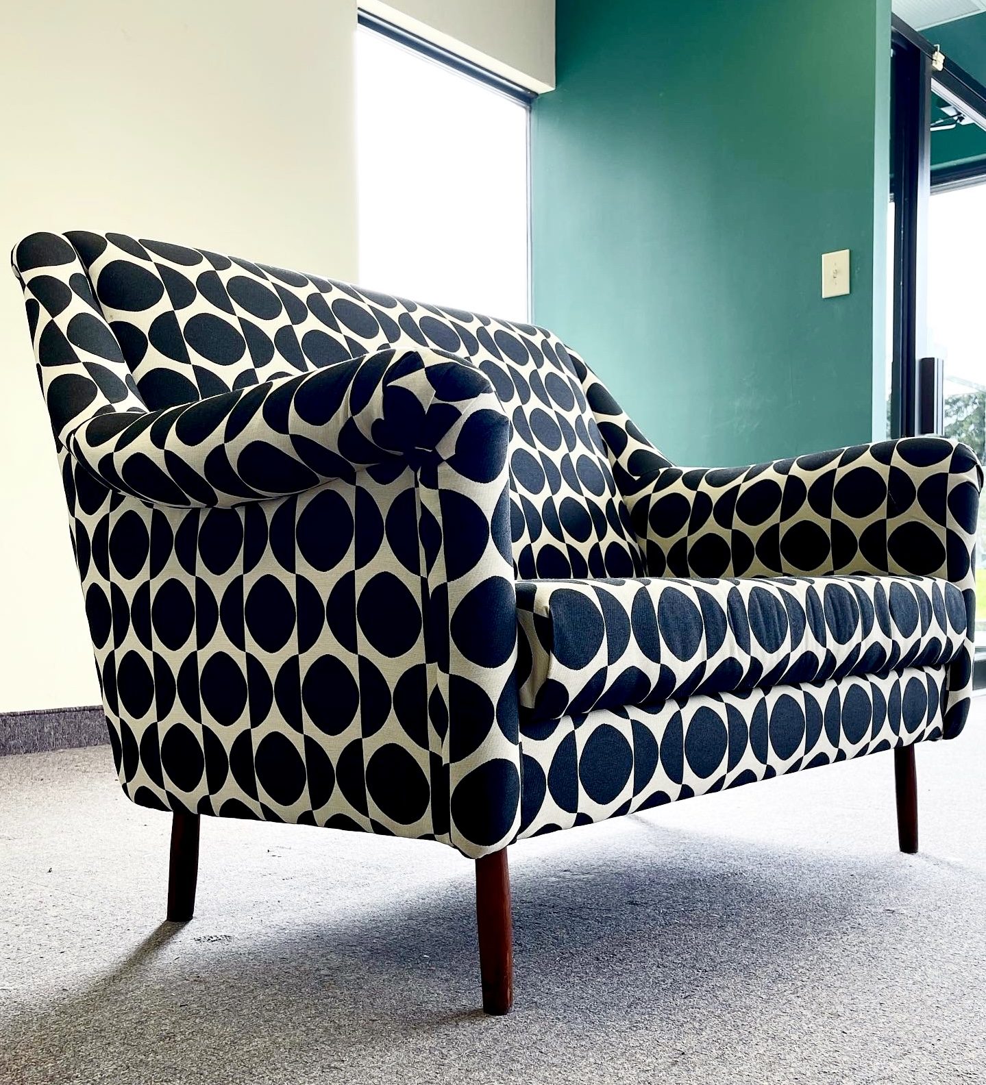 The same loveseat after reupholstery in a fresh fabric